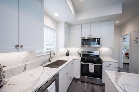Upstairs fully stocked kitchen.
