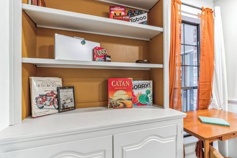 Board games and books available in the game room