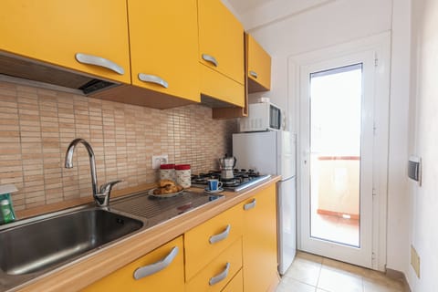 Family Apartment, 1 Bedroom (Monte Majore House 70B) | Private kitchen | Fridge, oven, stovetop, coffee/tea maker