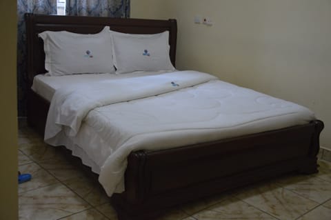 Comfort Room, Private Bathroom, City View | Individually decorated, desk, free WiFi, bed sheets