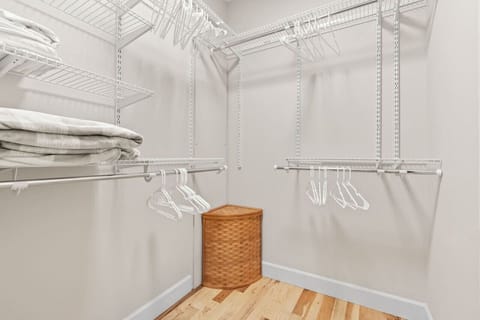 Primary bedroom's large walk-in closet.