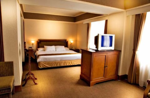 Junior Suite, Smoking | Premium bedding, memory foam beds, minibar, in-room safe