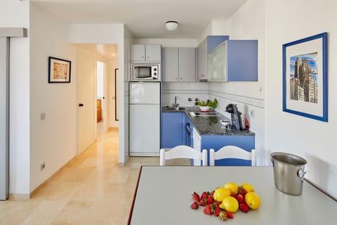 Apartment, 2 Bedrooms, Pool View | Private kitchen | Full-size fridge, microwave, oven, stovetop