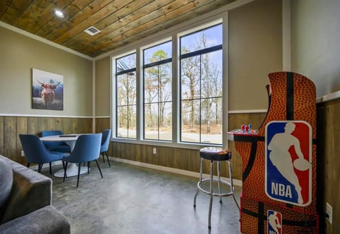 Challenge your friends to a game or enjoy a casual meal in this fun and inviting corner.