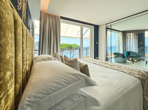 Suite, 2 Bedrooms, Sea View | Frette Italian sheets, premium bedding, minibar, in-room safe