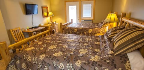Superior Suite, 2 Queen Beds, Kitchenette | Desk, iron/ironing board, free cribs/infant beds, rollaway beds