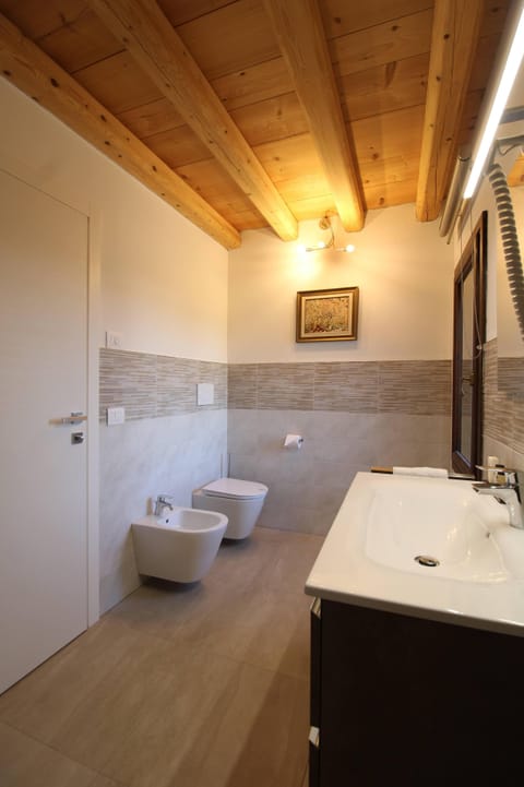 Deluxe Double Room, 1 Double Bed | Bathroom | Shower, rainfall showerhead, designer toiletries, hair dryer