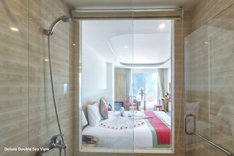 Deluxe Double or Twin Room, Balcony, Sea View | Bathroom | Shower, rainfall showerhead, designer toiletries, hair dryer