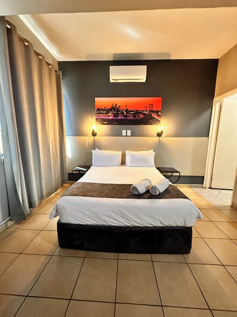 Deluxe Room | 1 bedroom, blackout drapes, free WiFi, bed sheets