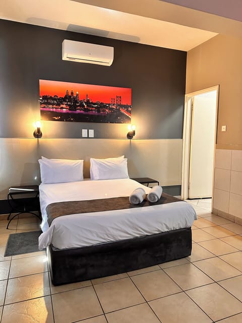 Deluxe Room | 1 bedroom, blackout drapes, free WiFi, bed sheets