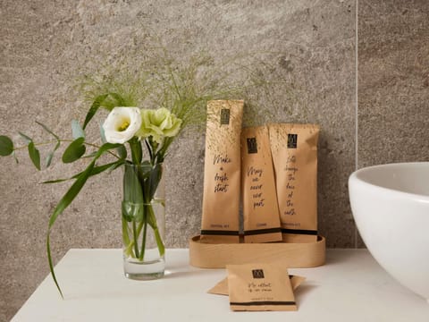 Pillowtop beds, free minibar, in-room safe, laptop workspace