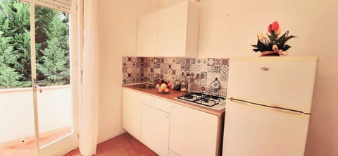 Family Apartment | Private kitchen | Electric kettle, highchair