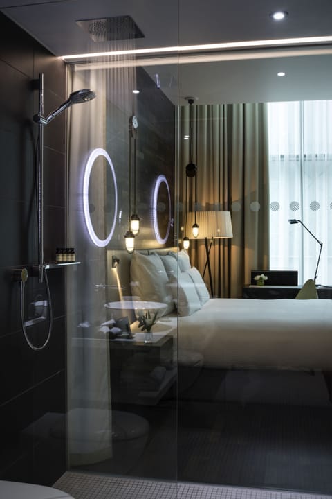 Shower, rainfall showerhead, designer toiletries, hair dryer