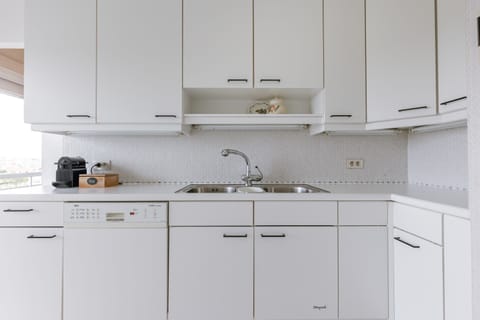 Kitchen with coffee machine