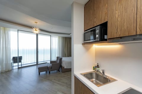 Honeymoon Double Room, Ocean View, Beachside | Private kitchen | Mini-fridge, cookware/dishes/utensils, paper towels