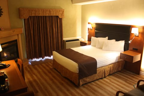 Junior Suite, 1 Queen Bed, Fireplace | Desk, iron/ironing board, free WiFi, bed sheets