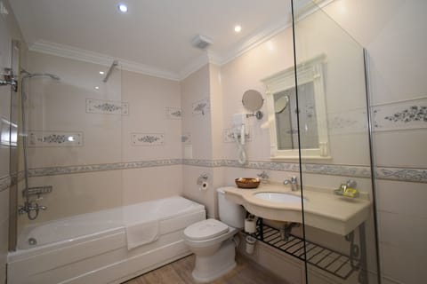 Standard Studio | Bathroom | Bathtub, designer toiletries, hair dryer, bathrobes