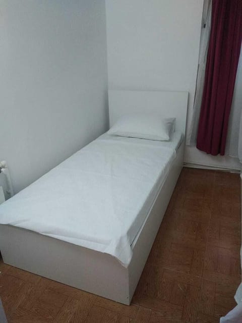 Economy Quadruple Room, Men only, Non Smoking | Desk, laptop workspace, iron/ironing board, free WiFi