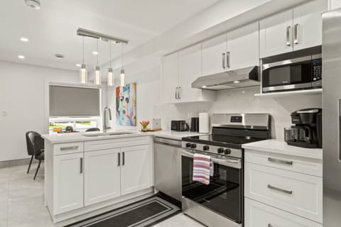 Glossy surfaces reflect light across the room.