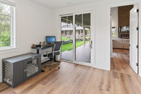 This pet friendly home comes with it's own crate for your smaller dog friends