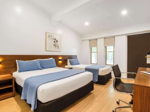 Standard Room, Multiple Beds | Minibar, desk, soundproofing, iron/ironing board