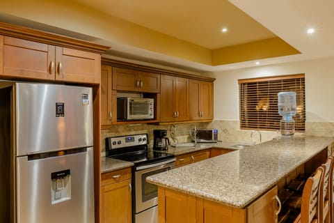 Family Condo, 2 Bedrooms, Ocean View | Private kitchen | Microwave, coffee/tea maker, cleaning supplies