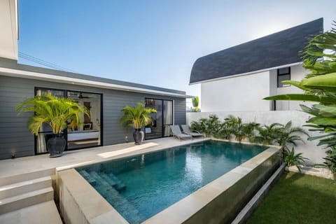 Serene villa with a private pool, inviting relaxation in a sun-kissed retreat.