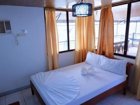 Standard Room, 1 Queen Bed, Balcony, Beach View | Premium bedding, individually decorated, individually furnished, desk