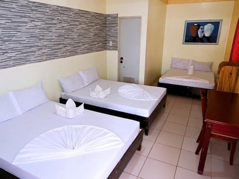 Standard Room, Multiple Beds, Balcony, Beach View | Premium bedding, individually decorated, individually furnished, desk