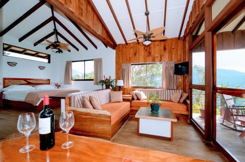 Deluxe Bungalow, 1 Bedroom, Balcony, Mountain View | Living area | TV