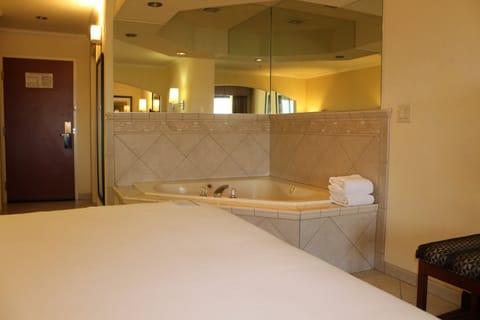 Suite, 1 Bedroom, Jetted Tub | Premium bedding, down comforters, pillowtop beds, minibar