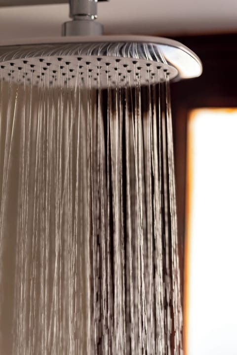 Family Apartment | Bathroom | Shower, rainfall showerhead, hair dryer, towels