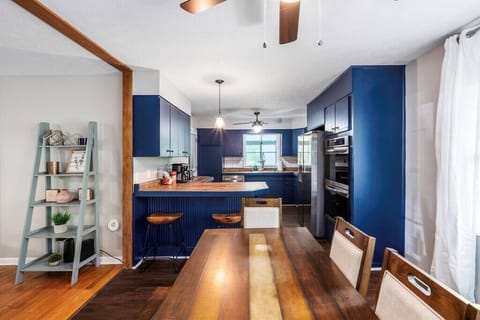 Dining room table seats at least 6 people. 2 stools at the bar. Full kitchen with stainless steel appliances.