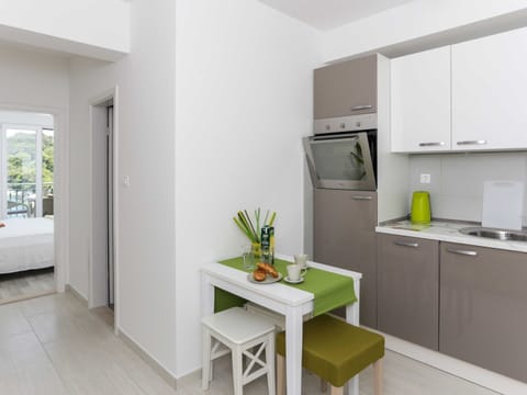 Apartment | Private kitchen | Fridge, oven, stovetop, dishwasher