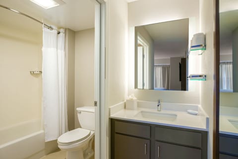 Suite, 2 Bedrooms | Bathroom | Free toiletries, hair dryer, towels