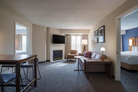 Suite, 2 Bedrooms | Living room | TV, video-game console, pay movies