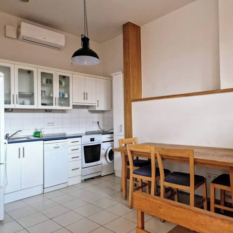 Family Apartment, City View | Private kitchen | Mini-fridge, microwave, stovetop, coffee/tea maker