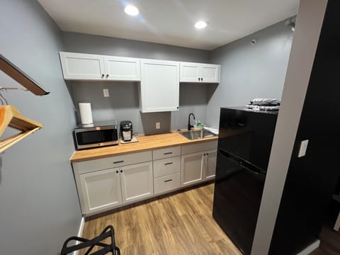 Superior Suite | Private kitchen | Fridge, microwave, cookware/dishes/utensils, freezer