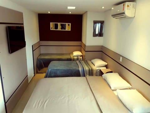 Basic Quadruple Room | Iron/ironing board, free WiFi, bed sheets