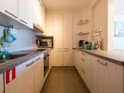 Apartment | Private kitchen | Microwave, electric kettle, toaster, highchair