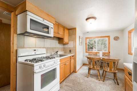 Riverview Cabin | Private kitchen | Microwave, coffee/tea maker, freezer, dining tables