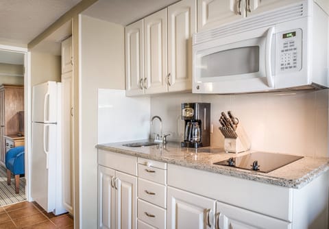 Condo, 1 Bedroom | Private kitchen | Full-size fridge, microwave, dishwasher, coffee/tea maker