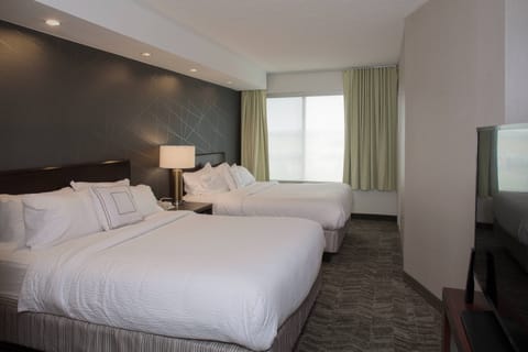 Suite, Multiple Beds | Pillowtop beds, in-room safe, desk, iron/ironing board