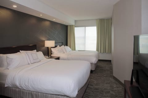 Suite, Multiple Beds, Non Smoking | Pillowtop beds, in-room safe, desk, iron/ironing board