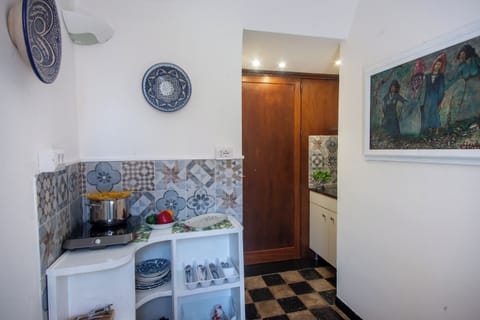 Family Apartment, 1 Bedroom (La Finestra Sul Giardino) | Private kitchenette | Fridge, stovetop, coffee/tea maker, electric kettle