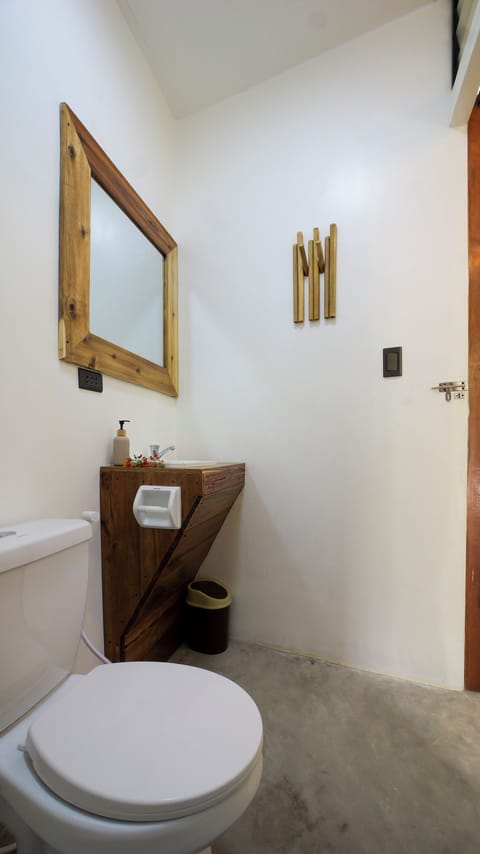 Basic Shared Dormitory | Bathroom | Shower, free toiletries, bidet, soap