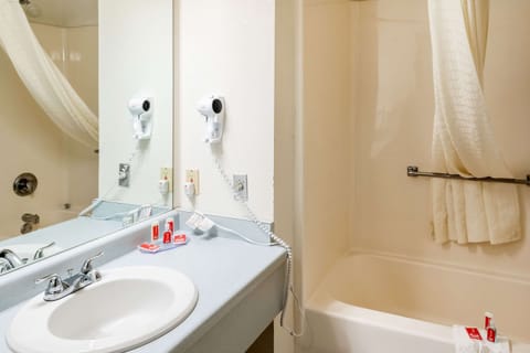 Standard Room, 2 Queen Beds, Non Smoking | Bathroom | Combined shower/tub, free toiletries, towels