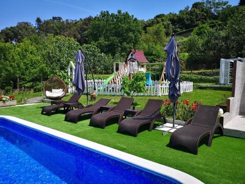 Seasonal outdoor pool, pool umbrellas, sun loungers