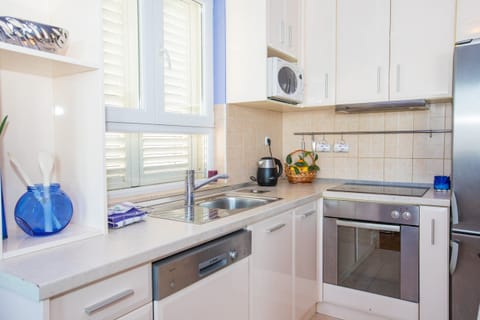 Apartment (Two Bedroom Apartment with Balcony an) | Private kitchen | Fridge