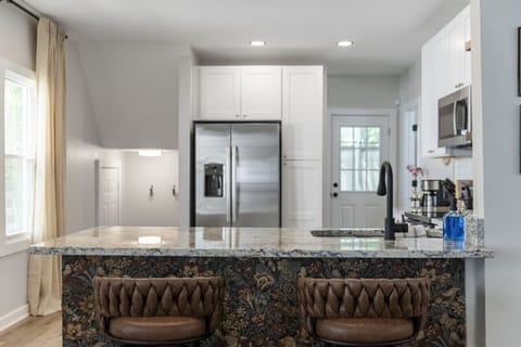 Sipping morning coffee in style with these chic marble vibes in the kitchen! ☕ #MarbleMagic